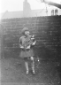 neg. Brenda & doll back yard