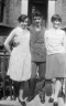 neg. brother & 2 girls doorstep